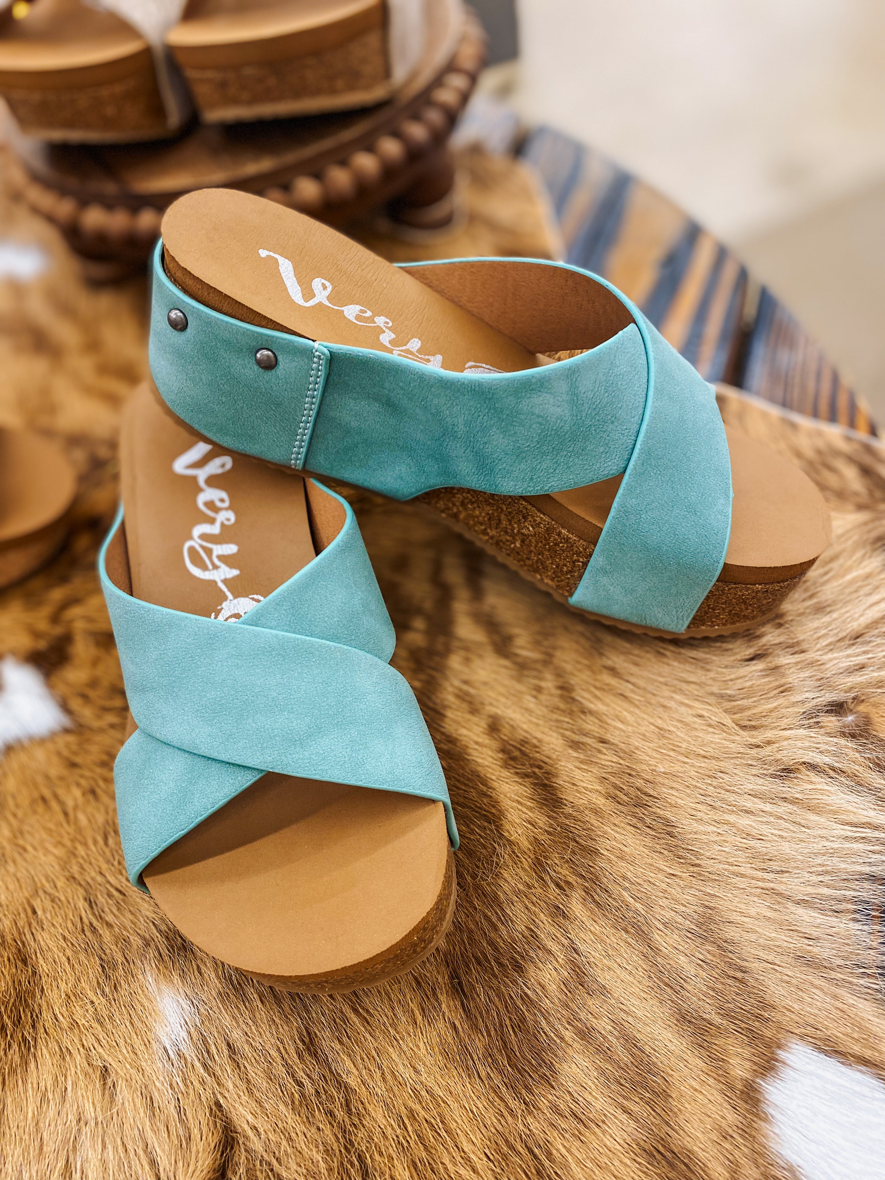 Shops turquoise colored sandals