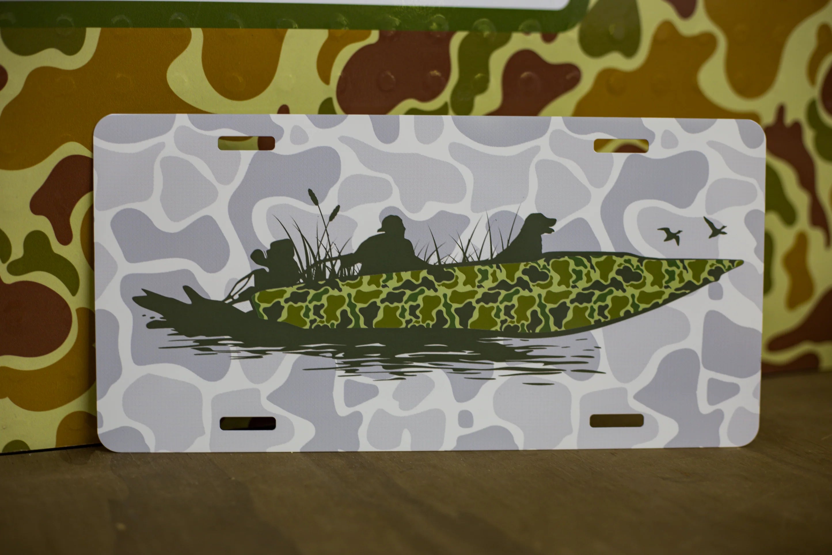 Decorative license plates in camo turkey, farm, and patriotic novelty designs