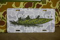 Decorative license plates in camo turkey, farm, and patriotic novelty designs