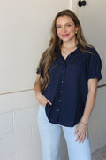 Dear John Benning poplin navy blouse, close-up front on model