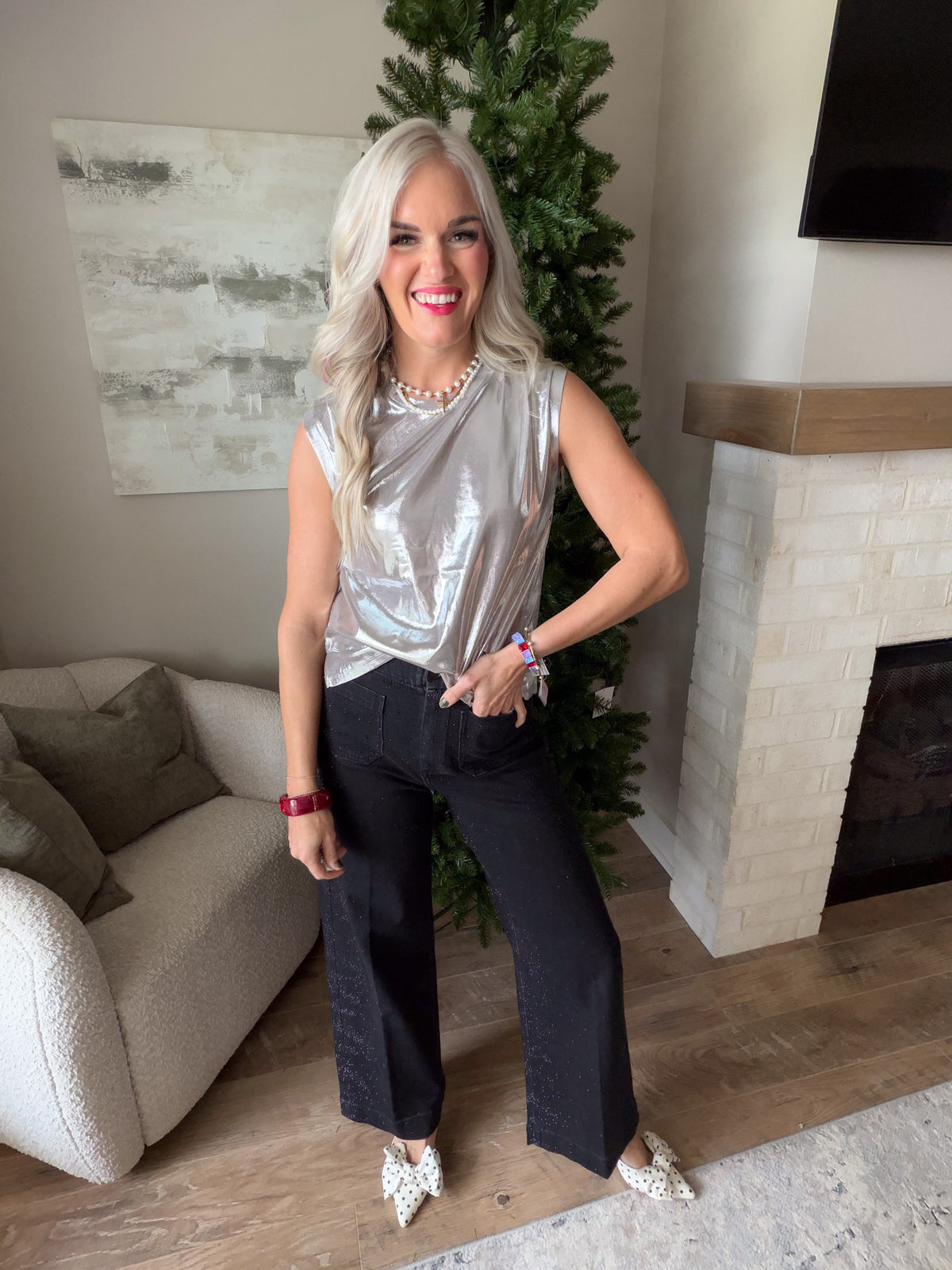 Dear John Charli metallic Silver top styled with black wide-leg trousers and printed pointed-toe flats.