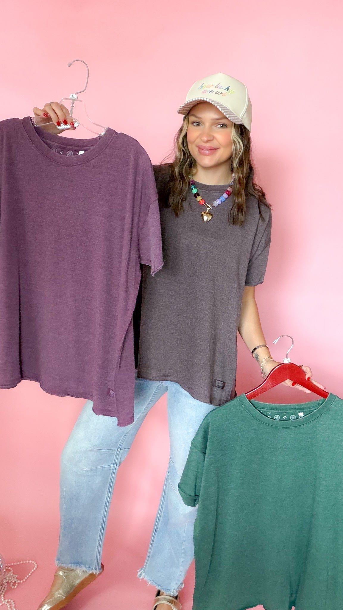 Purple and green raw edge vintage tees shown together