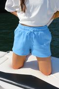 Speak With Confidence sweat shorts, shown in one of two available colors