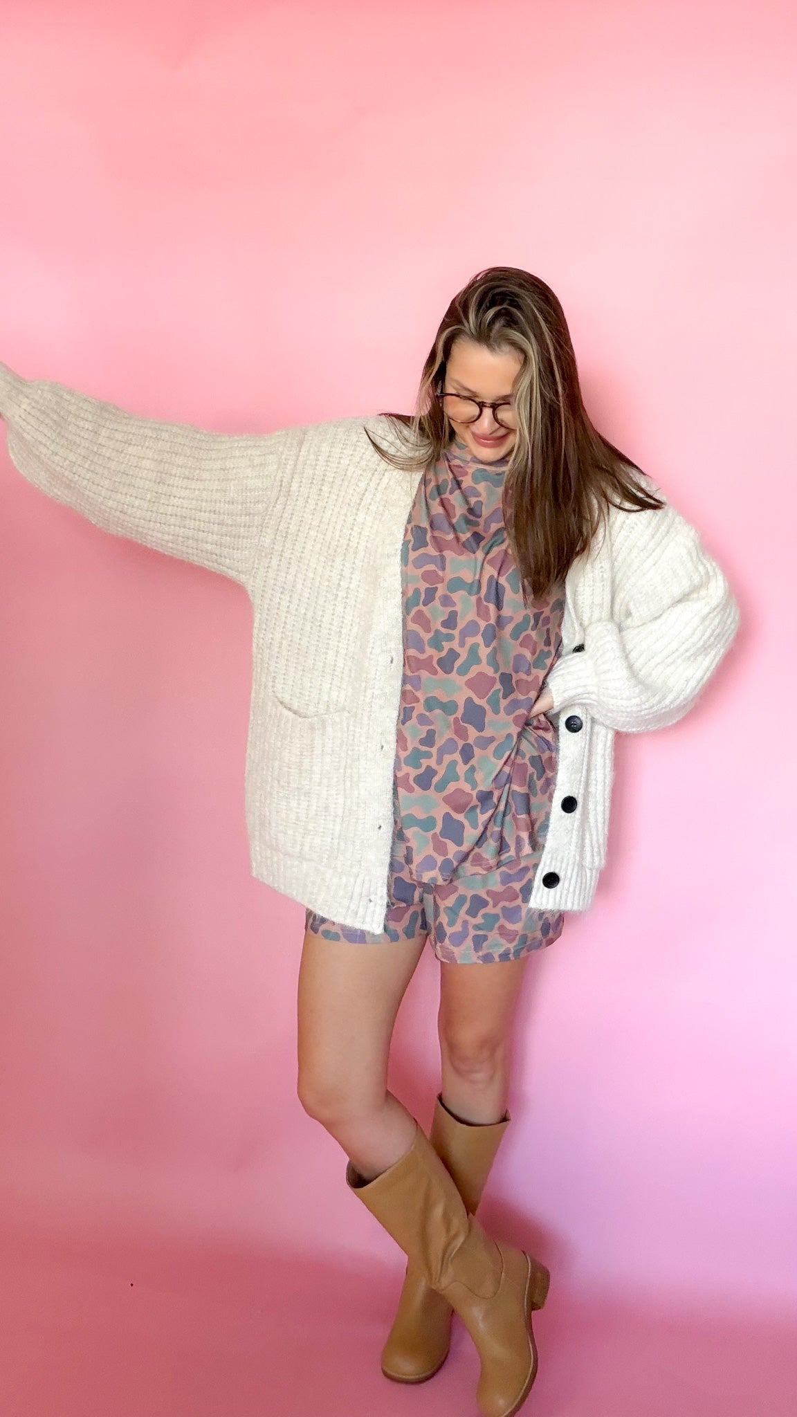 Oversized oatmeal chunky knit cardigan, button front, worn open over a graphic tee