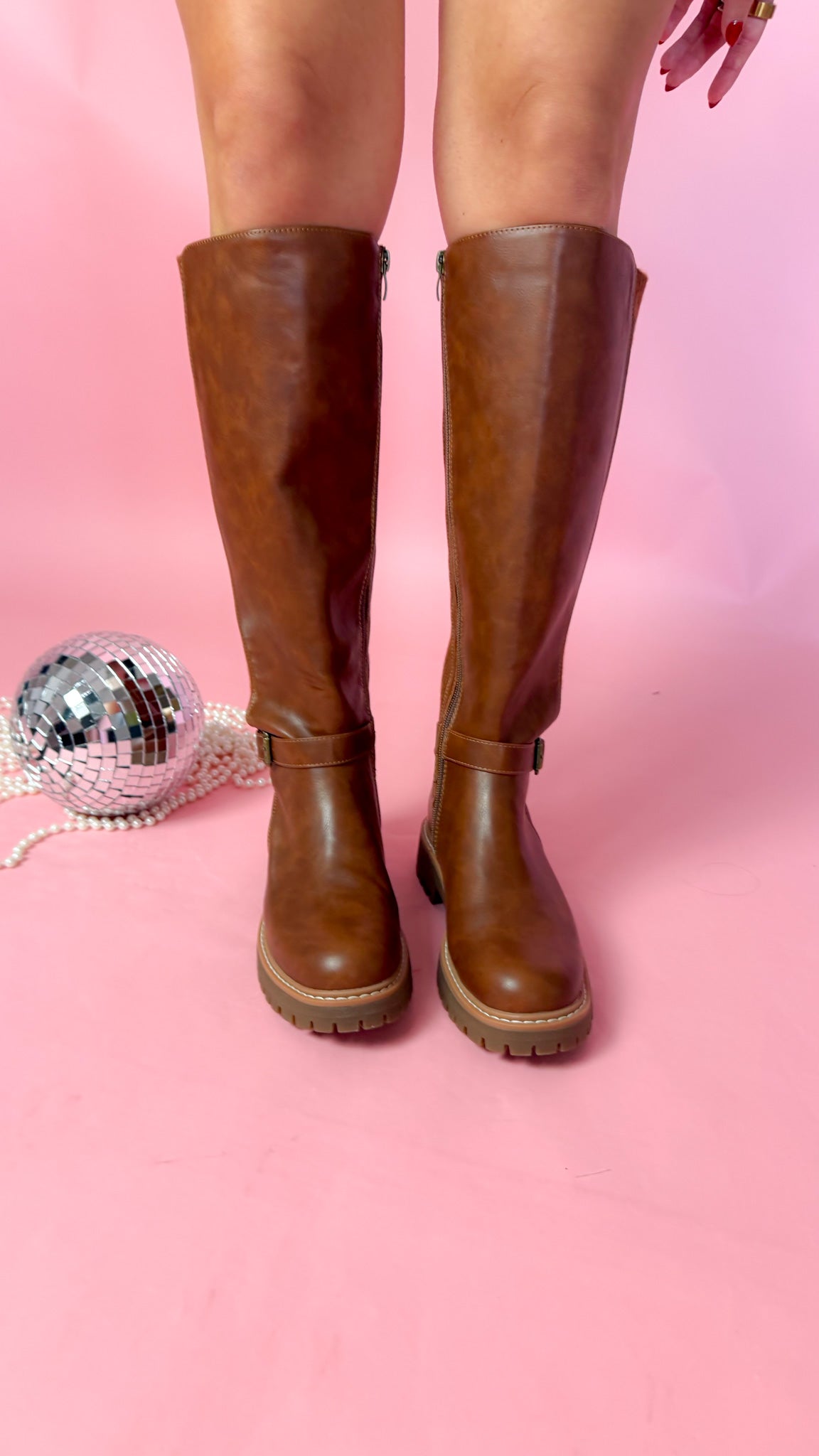 tall boots that hit under the knee