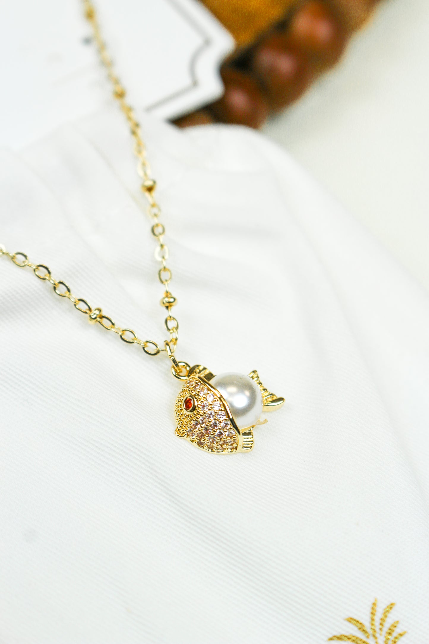 Gold Pearl Fish Necklace