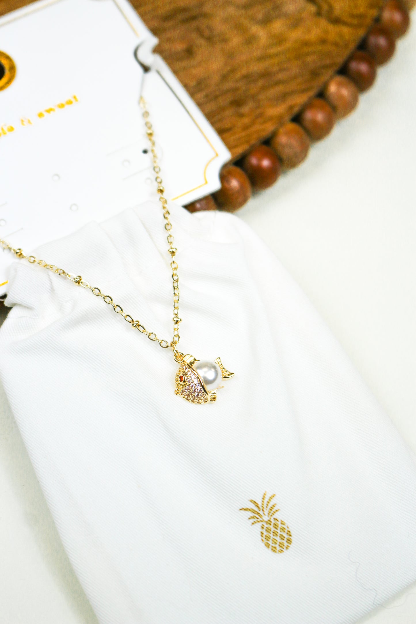 Gold Pearl Fish Necklace