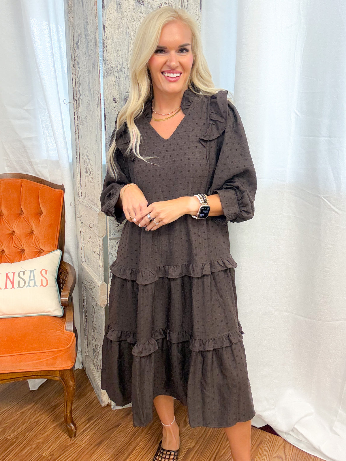 jenna pictured wearing the women's brown tiered midi dress
