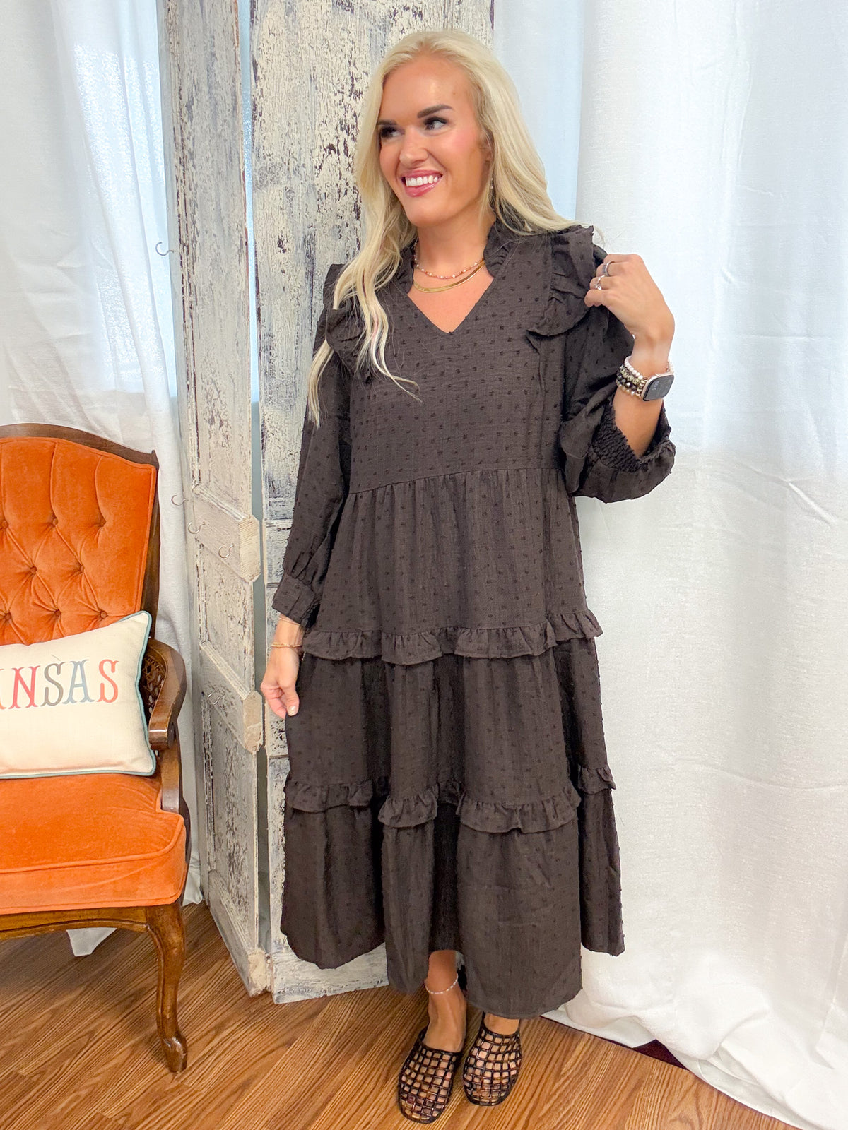 jenna pictured wearing the women's brown tiered midi dress
