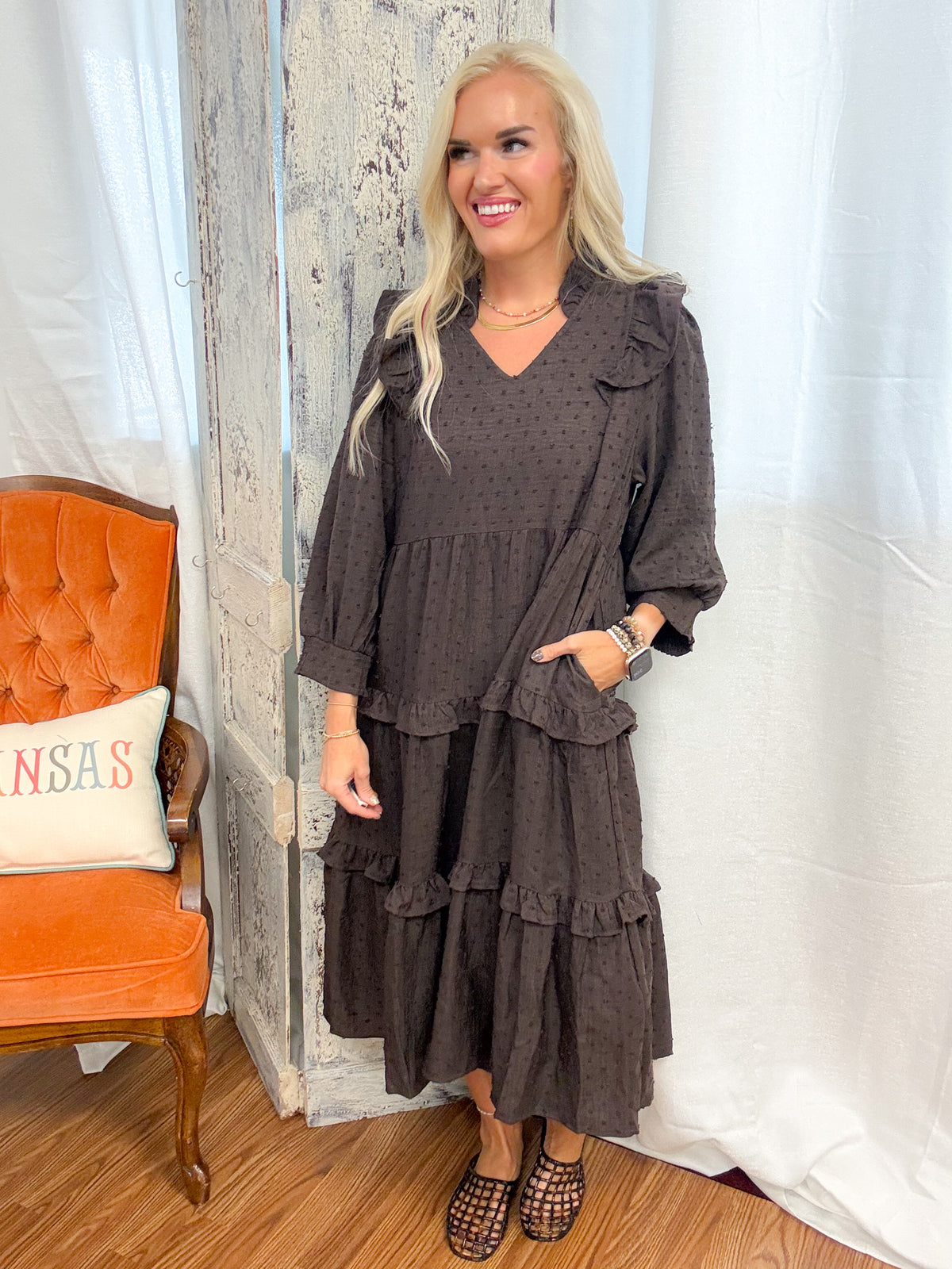 jenna pictured wearing the women's brown tiered midi dress