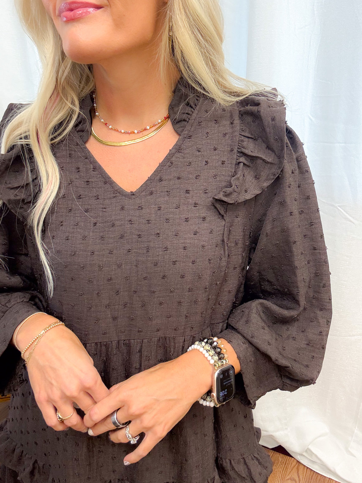 jenna pictured wearing the women's brown tiered midi dress