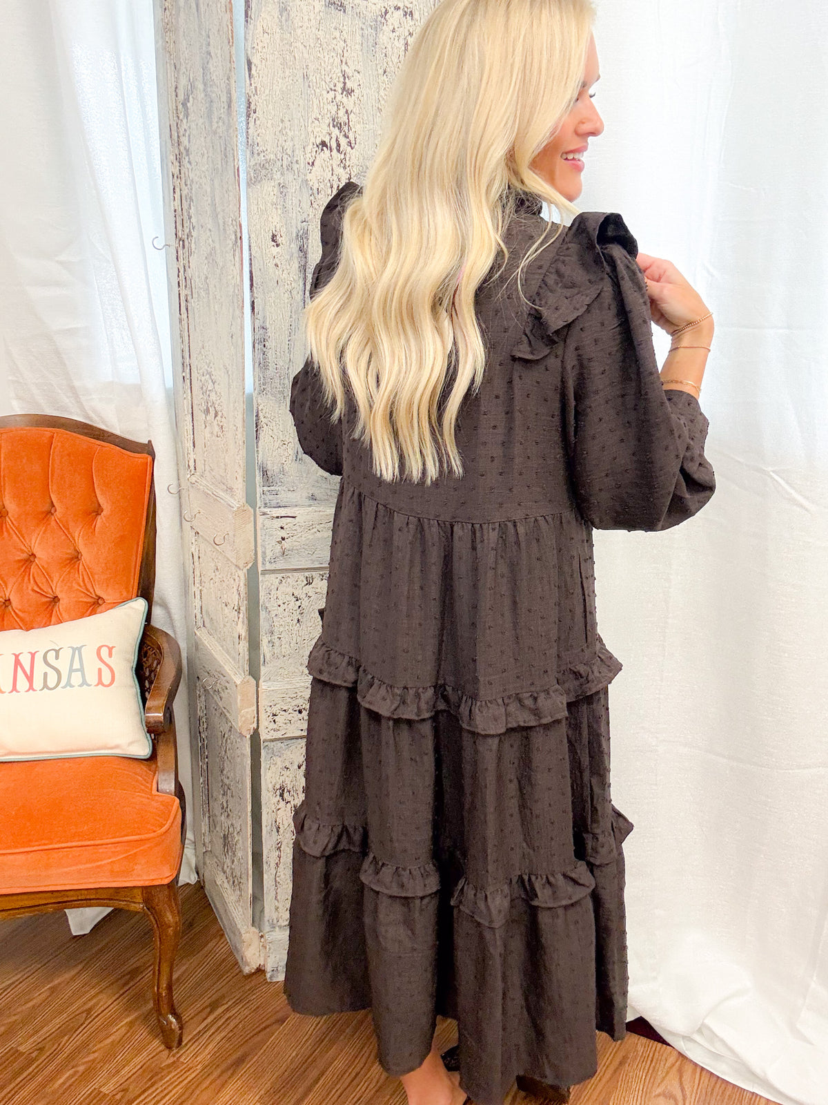 jenna pictured wearing the women's brown tiered midi dress