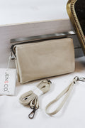 Riley crossbody wristlet bag, shown in one of several available colors