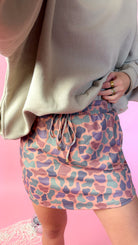 Women’s Birdie Cedar Marsh duck camo active skort with built-in biker shorts.