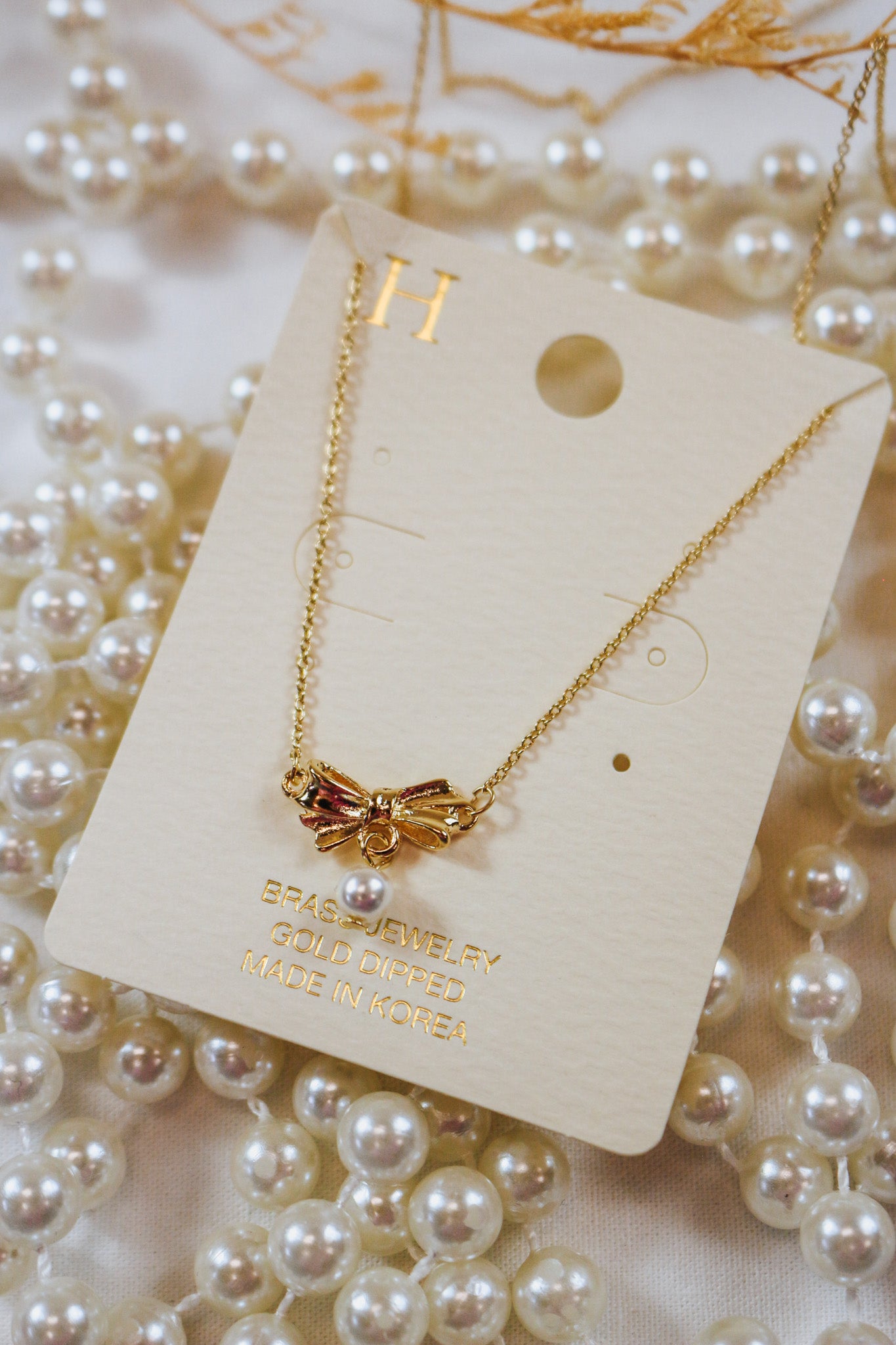 Gold Bow Pearl Necklace