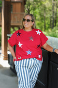 Sparkle graphic Fourth of July top, shown in one of three available colors