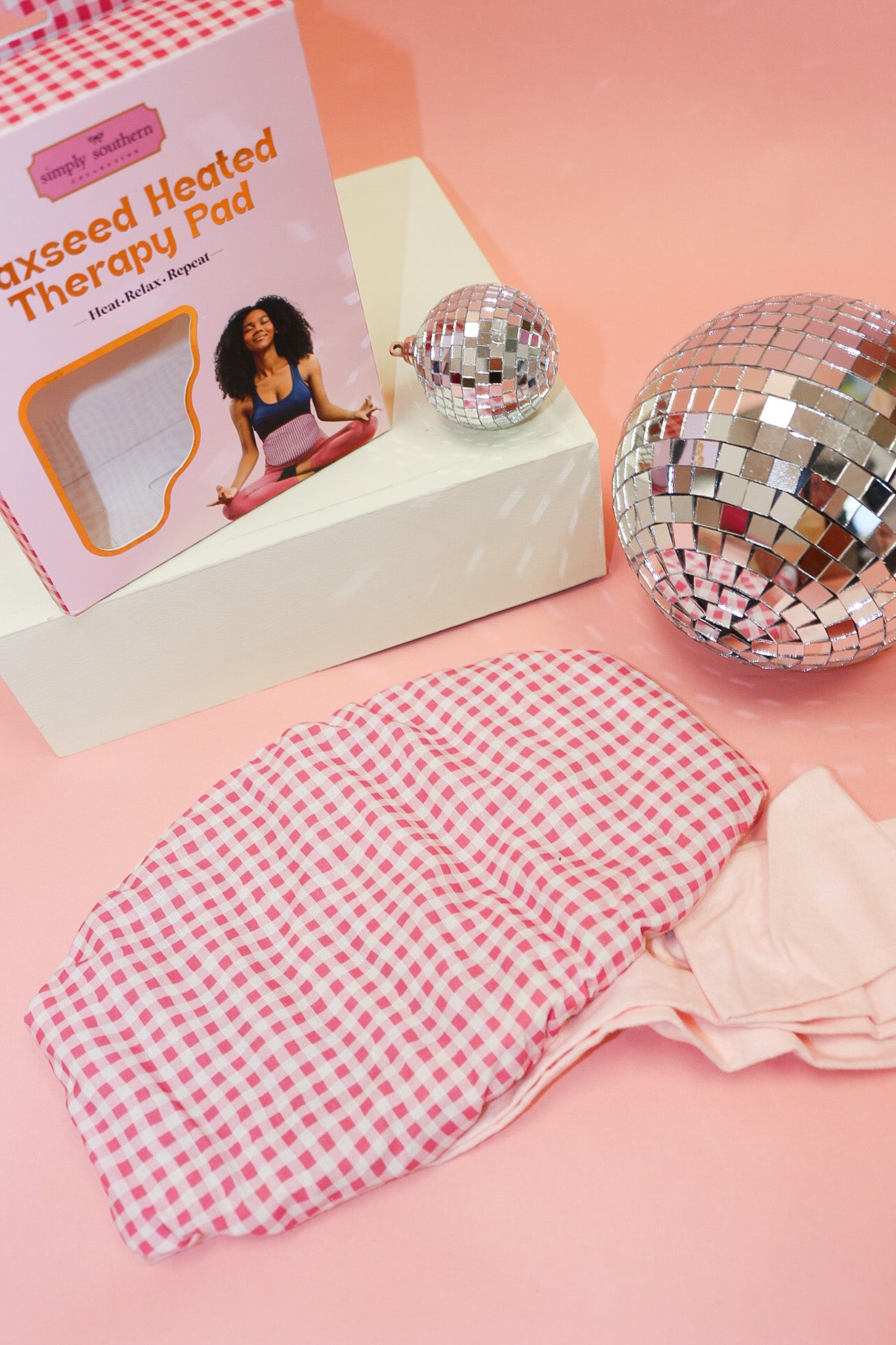 Simply Southern heated therapy pad, shown in one of three available colors
