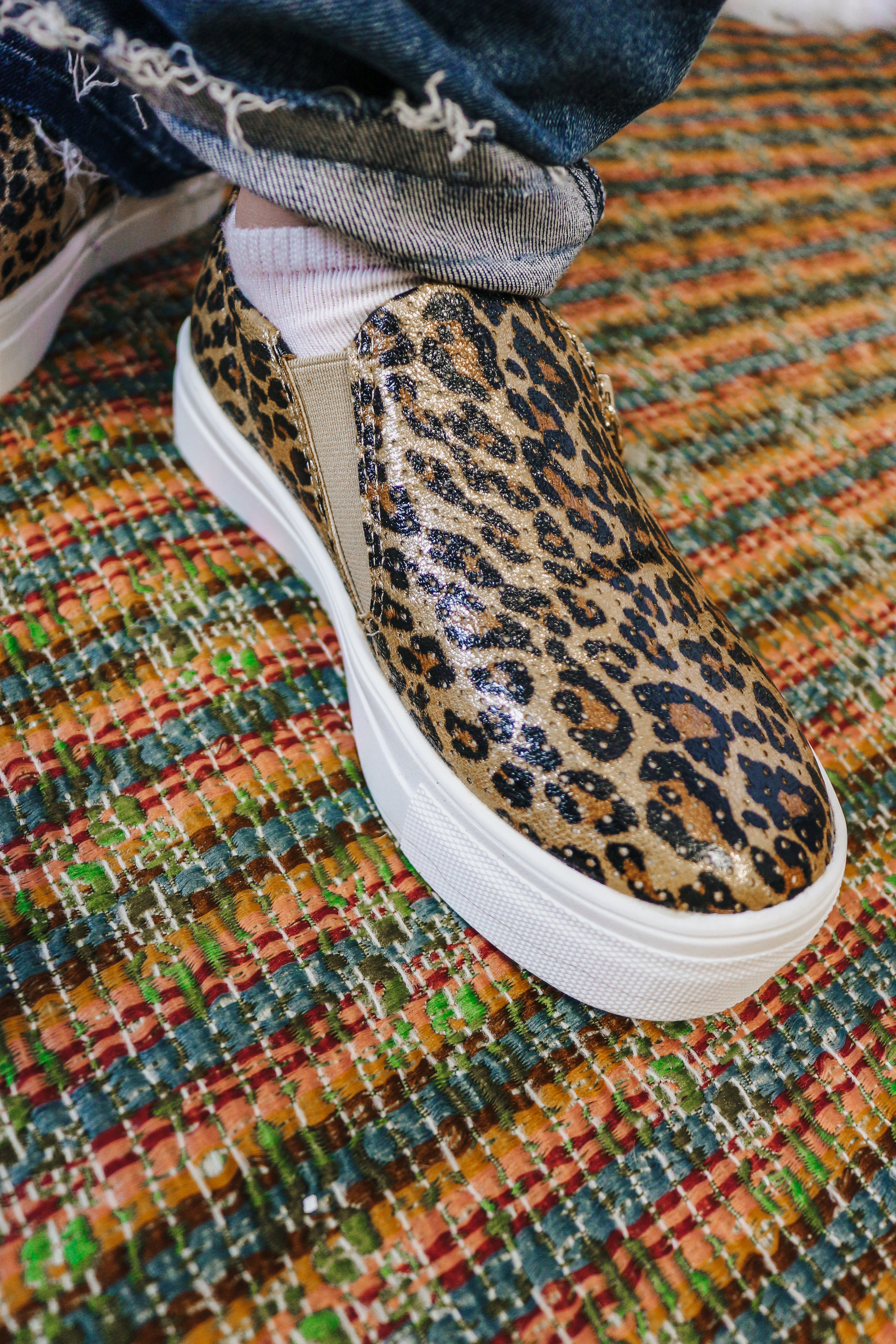 Leopard print slip on sale on tennis shoes