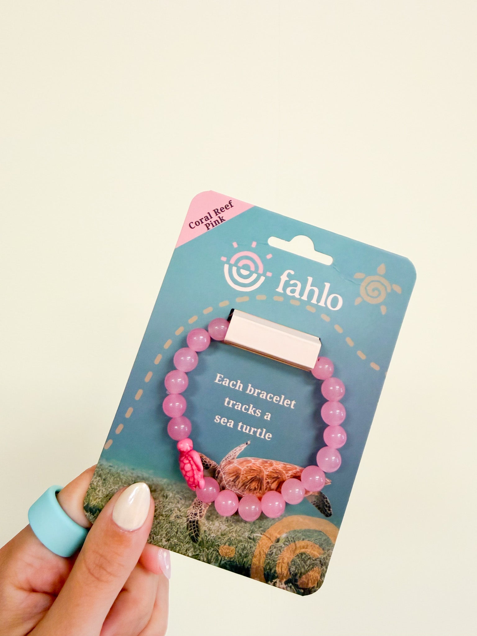 Fahlo Journey turtle tracking bracelet, shown in one of three available colors
