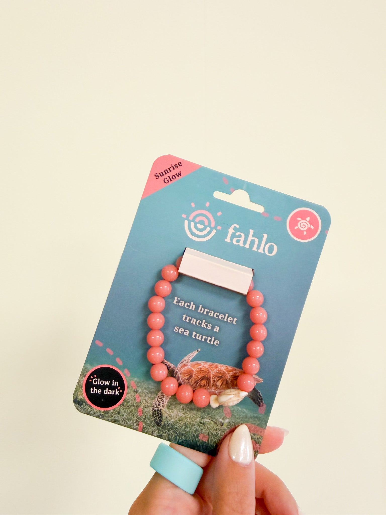 Fahlo Journey turtle tracking bracelet, shown in one of three available colors