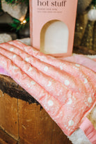 Hot Stuff Heated Neck Wrap in light pink, close-up of the quilted print and straps