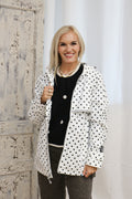 White polka dot hooded rain jacket