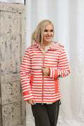White polka dot hooded rain jacket