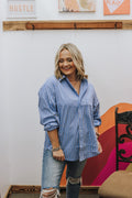 Light blue and white striped oversized button-up shirt