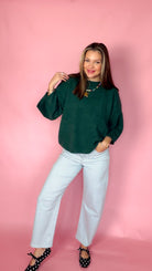 Sweet Nothings Hunter Green Sweater with light wide-leg jeans, front view