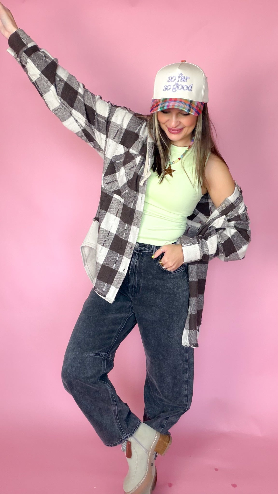 Good Company Hoodie Plaid Flannel in black and white worn with jeans and trucker hat