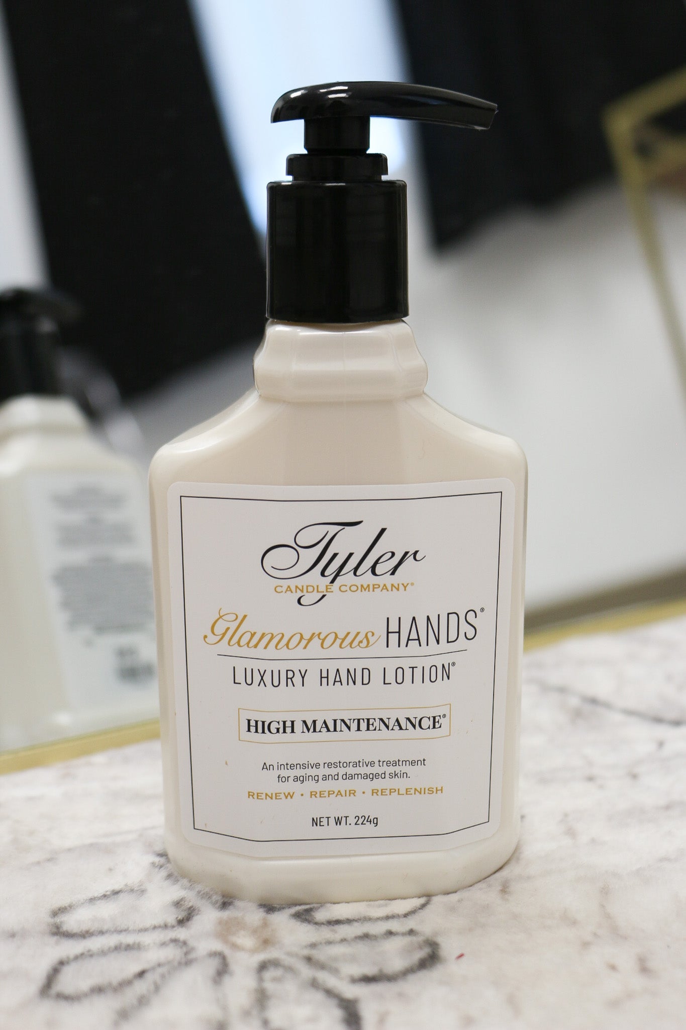 Tyler Luxury hand lotion 8oz, shown in one of two available scents