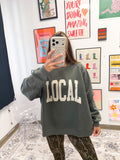 Local Girl Crescent crew sweatshirt, shown in one of four available colors