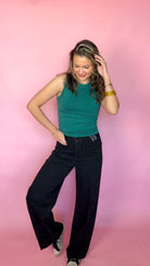 Dear John Audrey Black Stardust wide leg jeans on model, front view with green tank
