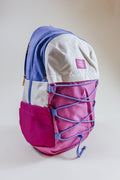 Simply Southern backpacks shown in camo, black, floral, pink cherry print, snake print, and navy floral
