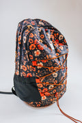 Simply Southern backpacks shown in camo, black, floral, pink cherry print, snake print, and navy floral
