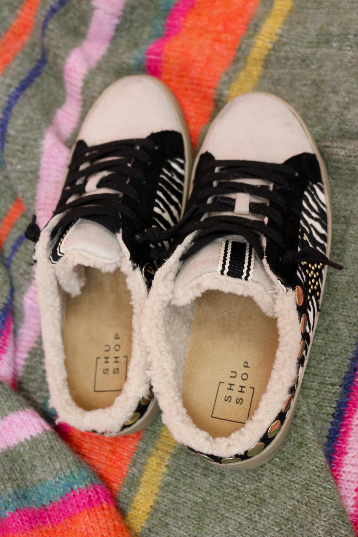 Top view of the Pippa zebra slip-on sneakers showing the sherpa-lined footbed