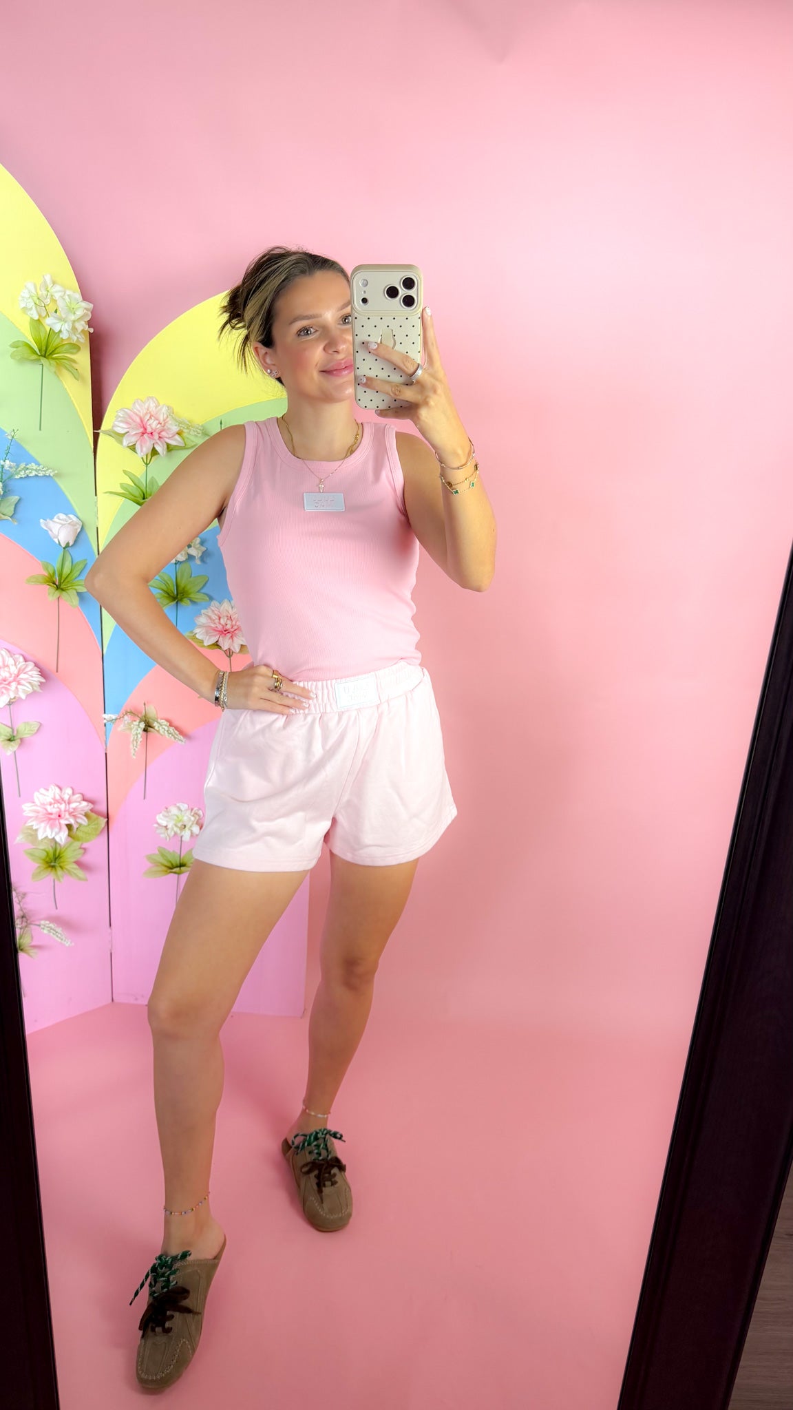 Lulu Mac white logo patch tank top, shown in one of three available colors