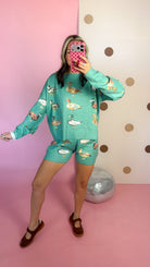 Mallard sea green set, mirror selfie with arm raised to the side