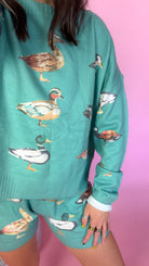 Mallard sea green set, close-up of duck print knit sweater