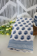 Blue floral print edge towel, shown in one of four available colors