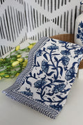 Blue floral print edge towel, shown in one of four available colors