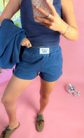 Lulu Mac women's terry cloth shorts, shown in one of four available colors