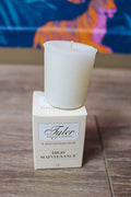 15-hour superior votive Tyler candle, shown in one of four available scents