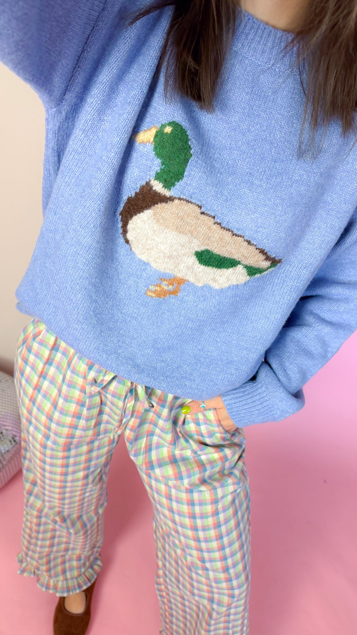 Close-up of the mallard duck motif and textured coastal blue knit on the Just A Chill Duck women's sweater.