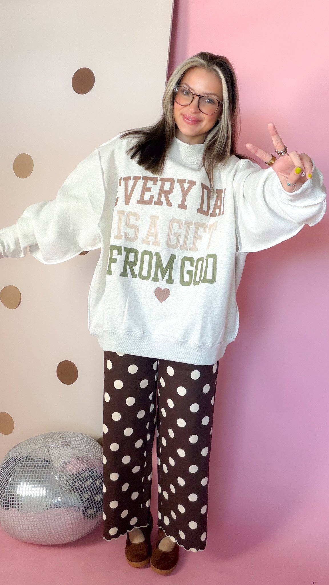 Front view of ash grey Every Day Is A Gift From God embroidered mock neck sweatshirt with polka dot pants