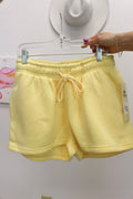 Speak With Confidence sweat shorts, shown in one of two available colors