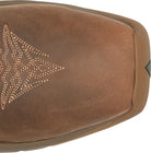 Close-up of a brown leather boot toe showing a decorative geometric stud pattern on the vamp and a light brown outsole edge against a white background.