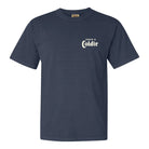 A navy blue short-sleeve t-shirt shown in the front. "crack a coldie" on front right chest
