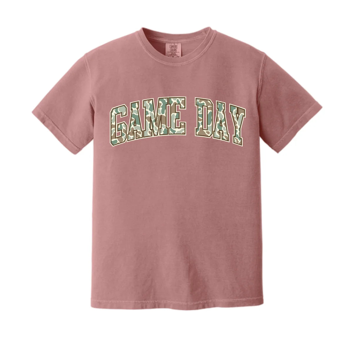 A dusty rose short-sleeve t-shirt with 'GAME DAY' printed across the chest in arched varsity letters filled with a green camouflage pattern, shown on a plain white background.