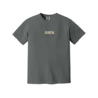A dark gray crewneck t-shirt with the word 'AMEN.' printed in a textured gold font on the center chest, displayed against a solid white background.